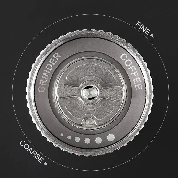 Adjustable coffee grinder dial showing fine and coarse grind settings on a black background