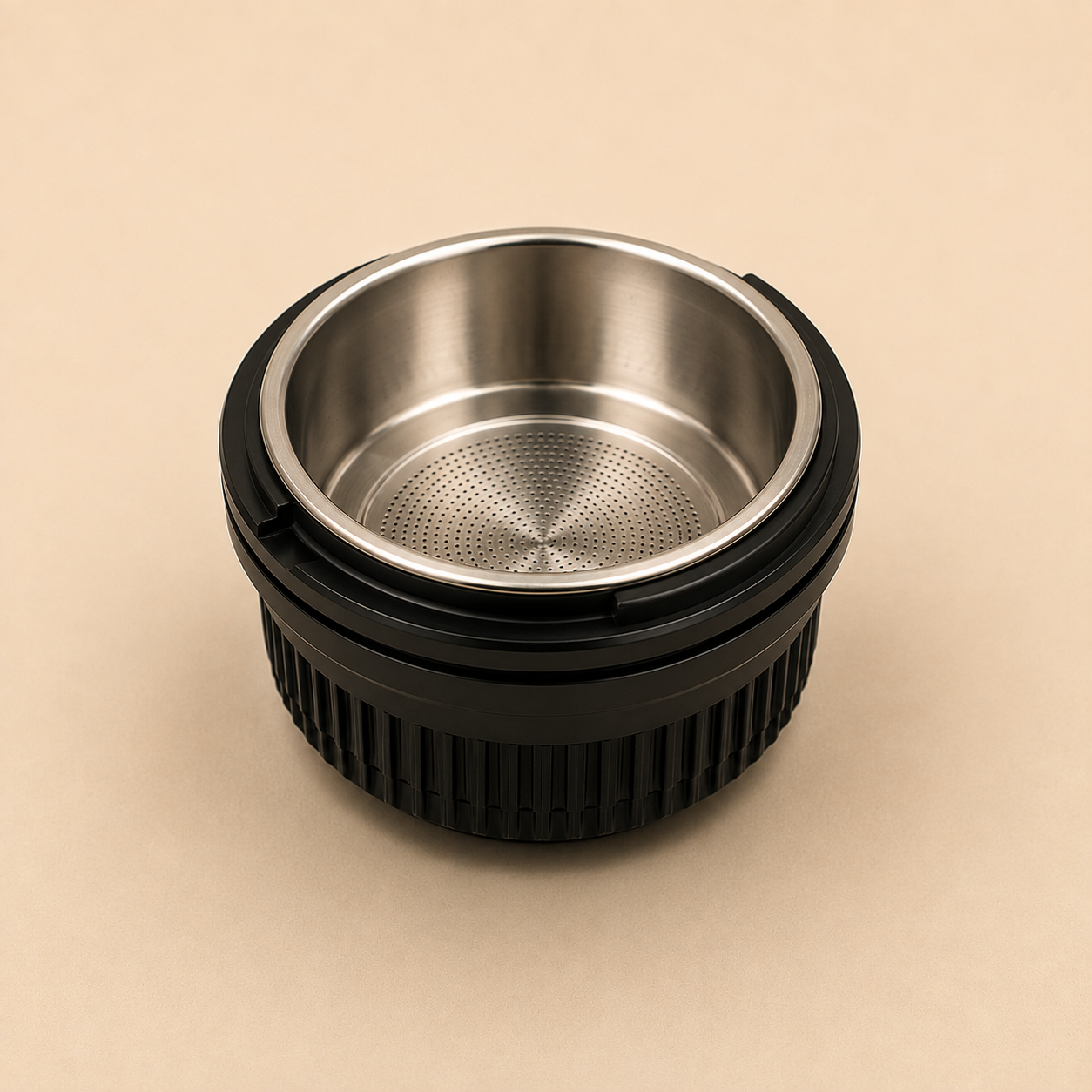 Origin Double Espresso basket showing deeper stainless steel coffee basket