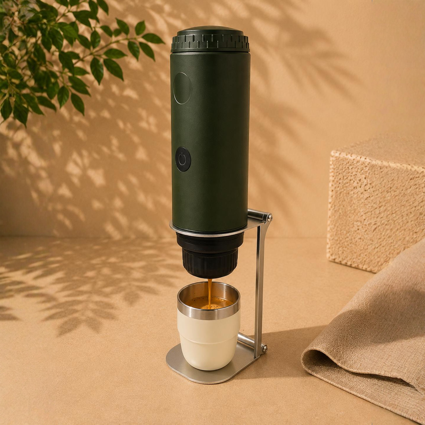 Kafira Origin portable espresso maker extracting coffee into a Cream Espresso Tumbler