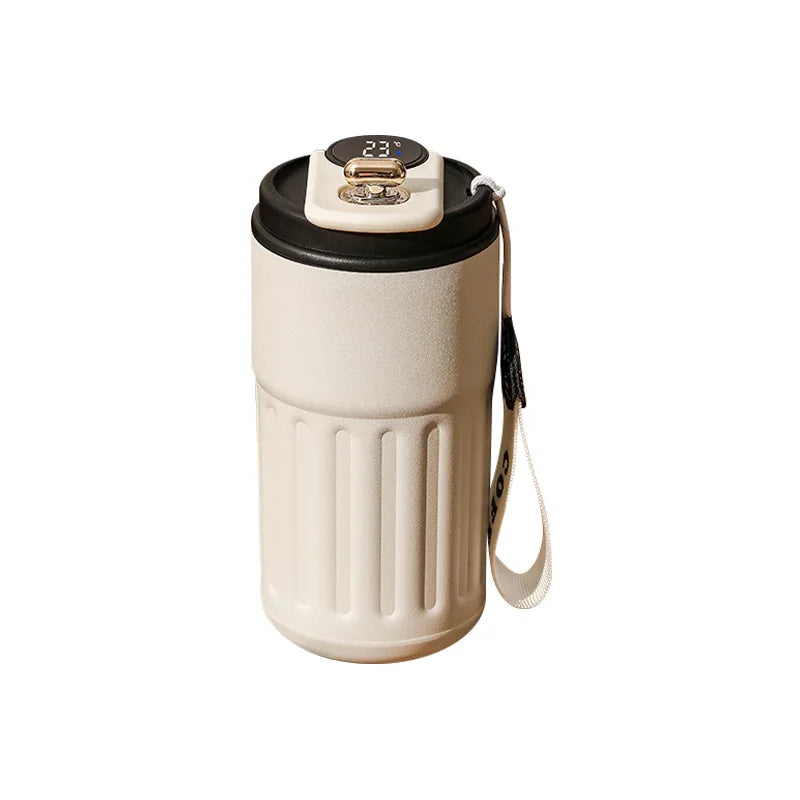 Beige insulated coffee travel mug with digital temperature display and carrying strap