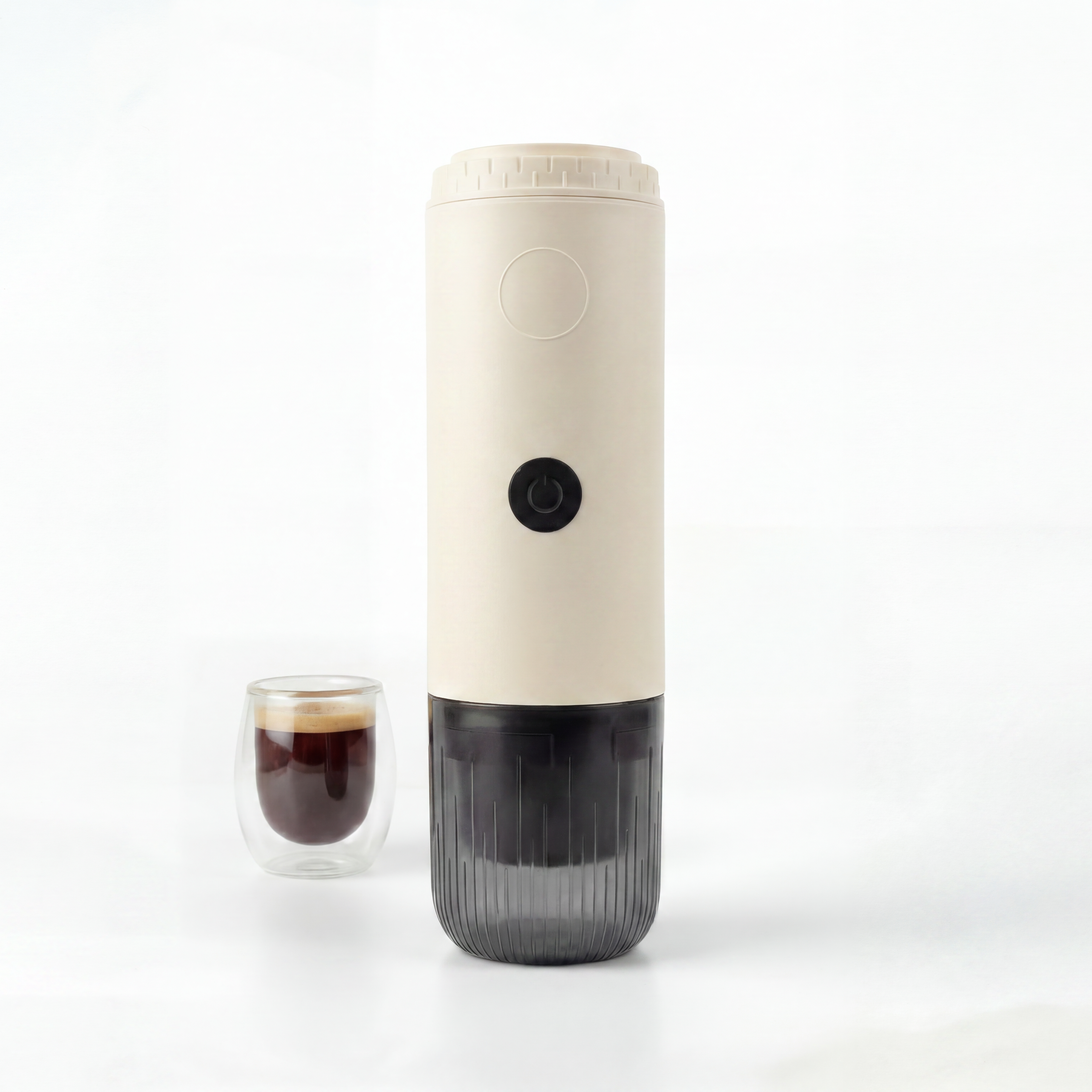 White Portable espresso maker with a glass of coffee on a white background